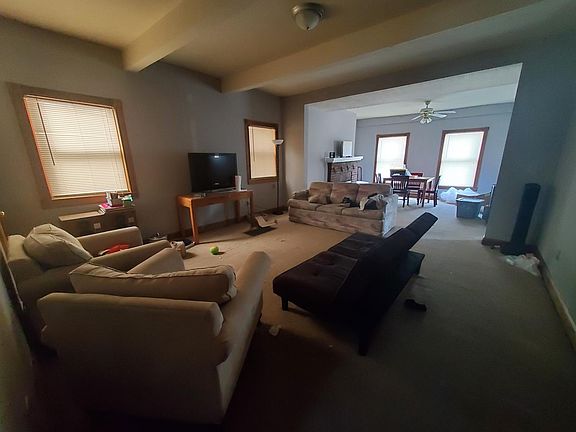 Living and dining room looking towards front of house