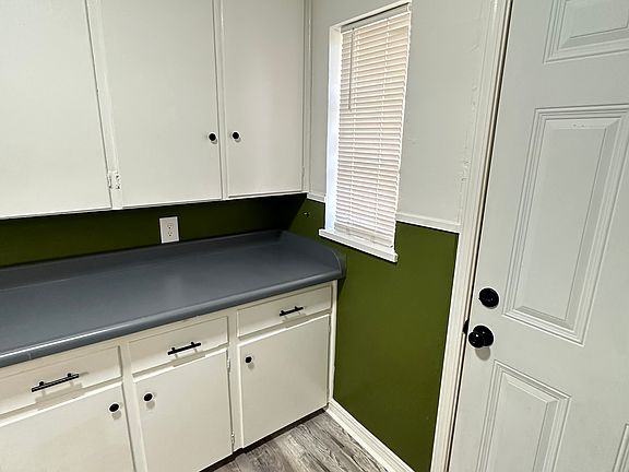 Kitchen access to back patio and carport