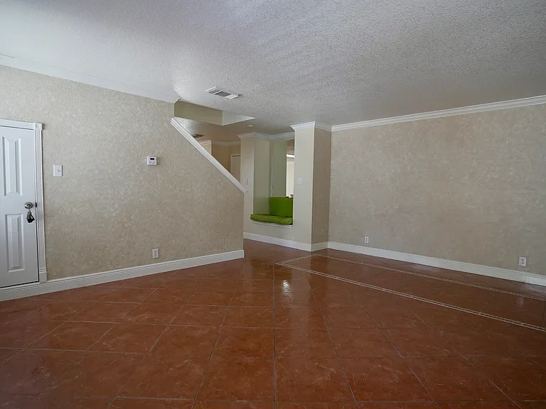 Entrance / LivingRoom / Storage Under Stairs