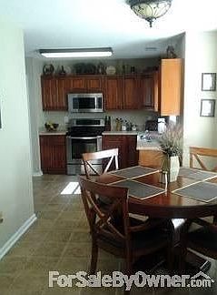 Kitchen
						:
						New cabinets, ceramic tile floors, countertops, and stainless appliances
