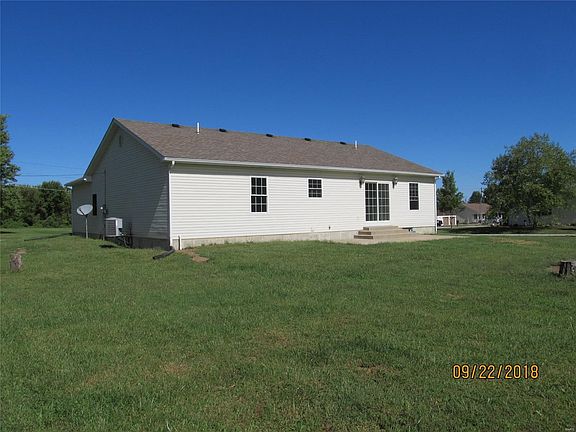 Like new home on lot and a half.