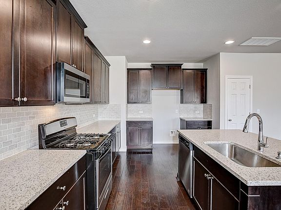 Gas stove, stone countertop, lots of storage. **Refrigerator INCLUDED.