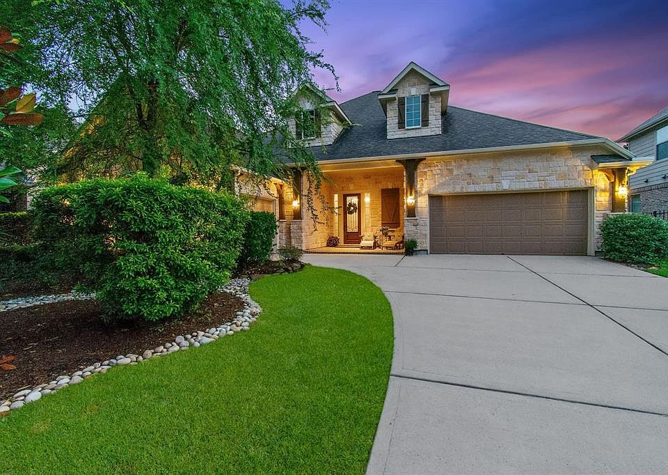 Welcome to 115 S. Beech Springs! 4 bedroom brick and stone exterior with a charming front covered porch and 3 car garage.