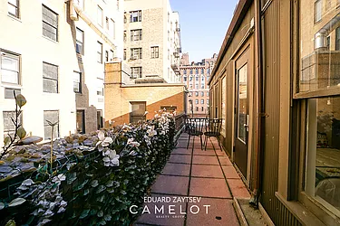 Sold by Camelot Realty Group