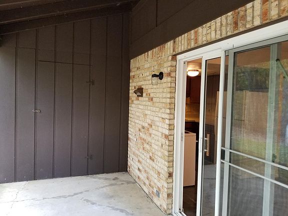 Covered Rear Patio with Outdoor Storage Unit