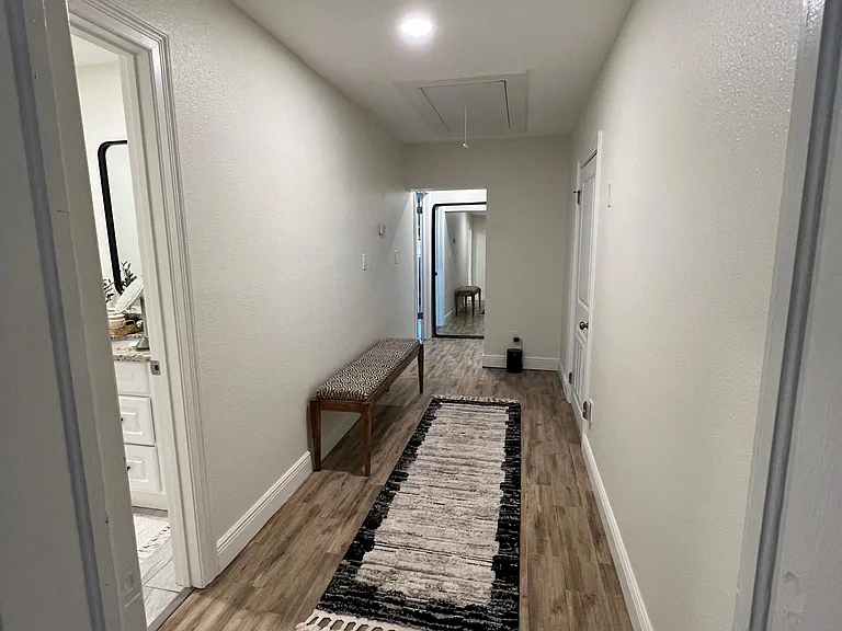 Hallway to Guest Bathroom and Laundry/Utility Room