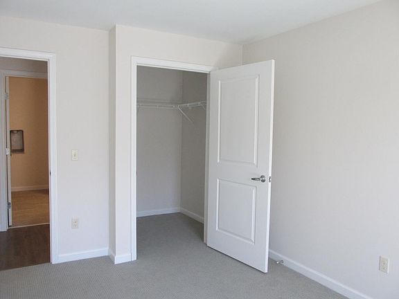 Bedroom with walk-in closet
