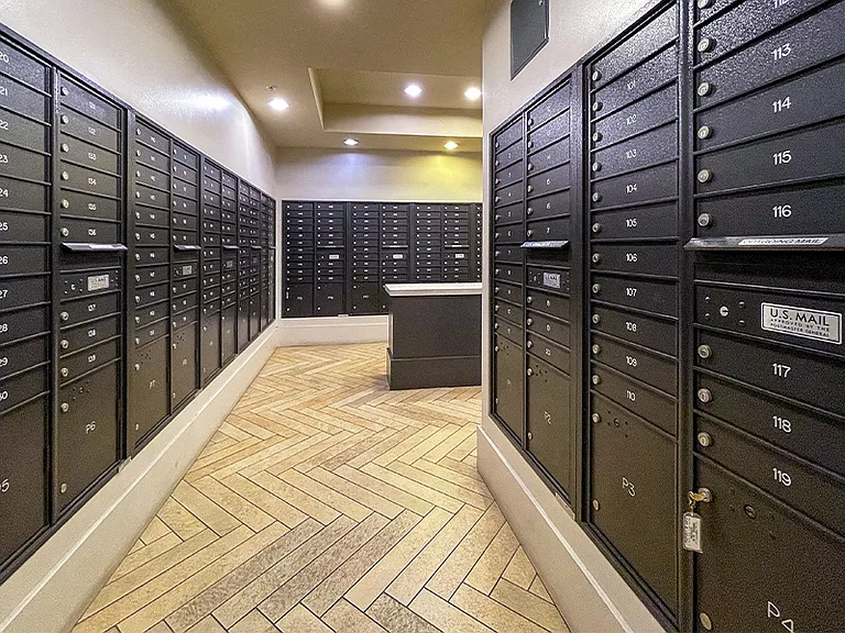 Community mail room with package delivery notification