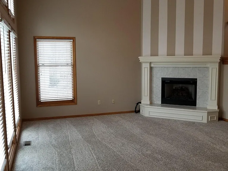 Living room view from the doorway (#1).