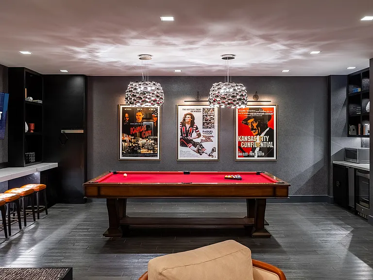 The refreshed theater and social room at One Light Luxury Apartments