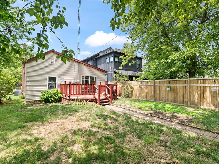 Fully fenced rear yard with large back patio