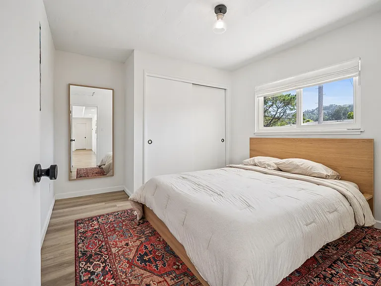 Comfortable guest bedroom with queen bed