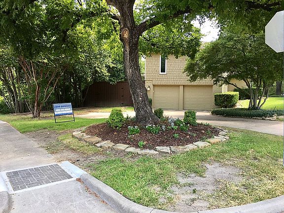 SW corner of .27 acre lot