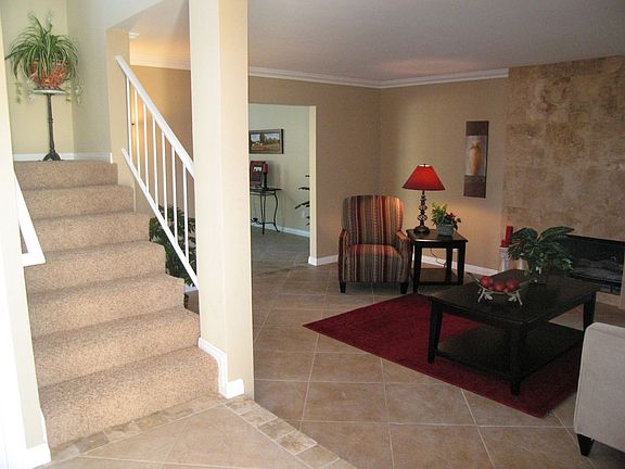 Stairs and living room from entryway