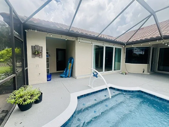 Brilliant blue waters await you, your family & friends when you lease. Alcove shelving for your pool toys (for convenience only), and access to the pool bath; convenient for out of town guests to enjoy a late dip in the pool as well.