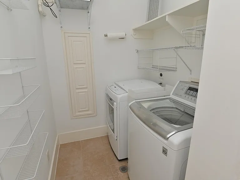 2nd floor laundry room. Washer and dryer included. Tankless water heater and storage.