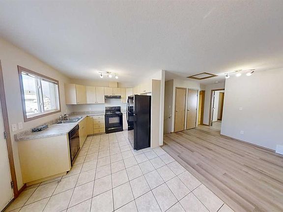 4th image of 9225 93rd Ave Unit 305