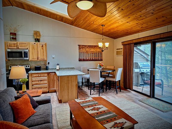 Living room, dining area, view to the deck