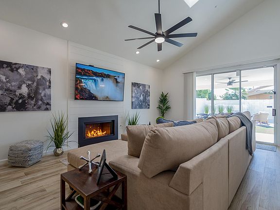 Family Room: Newer 75" Smart TV +Natural Gas Fireplace