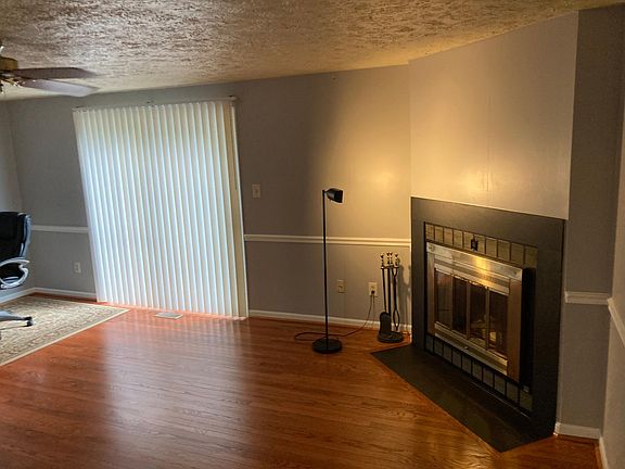 Living Room with diagonal wood burning Fireplace