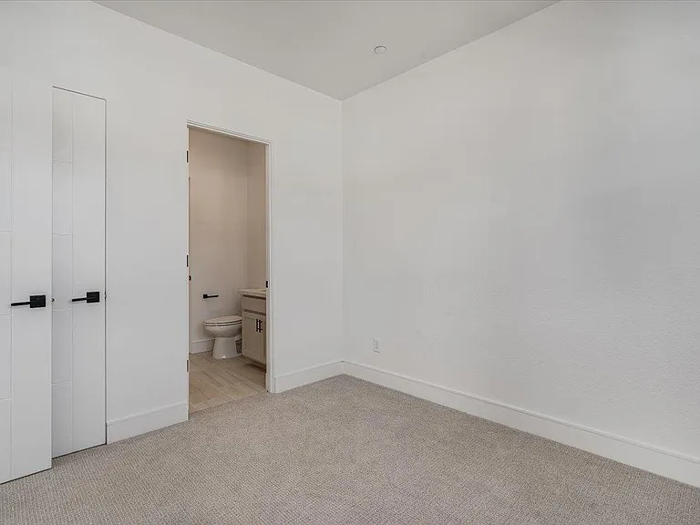 bedroom with attached bathroom