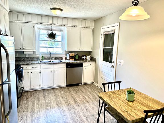 Kitchen with door leading to laundry/garage