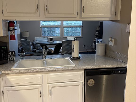 Kitchen - with dining area/living room in background