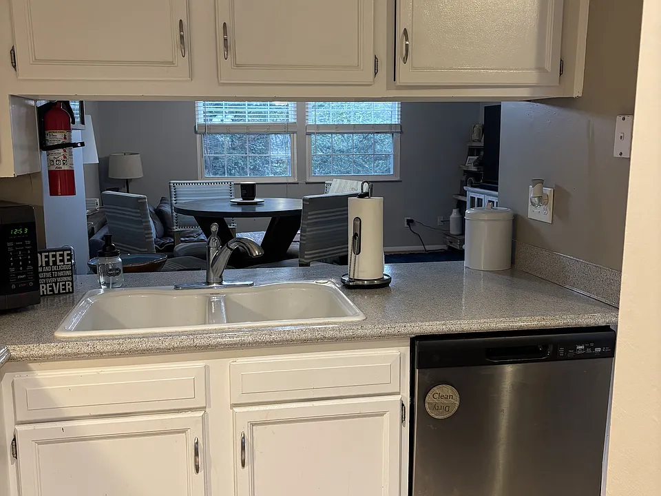 Kitchen - with dining area/living room in background