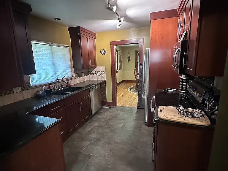 210 N Shields St — Photo 8