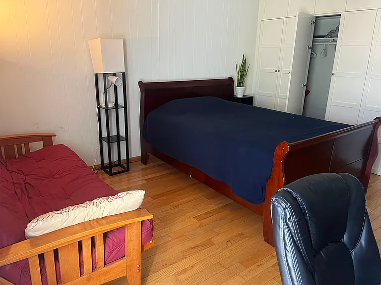 Master bedroom and new queen sized mattress with sofa bed