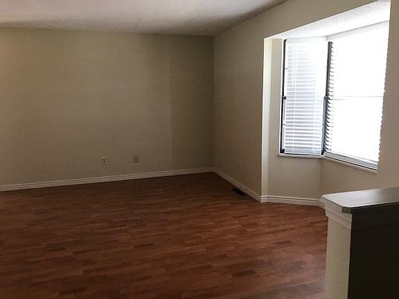 Front room, hardwoods and bay window