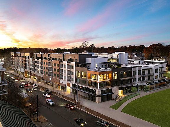Experience luxurious city living in this contemporary apartment complex, perfectly nestled in a bustling urban setting.