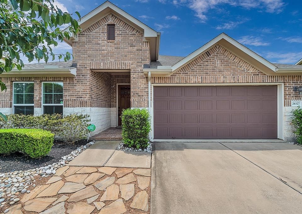 Lovely stone and brick elevation on this Meritage home