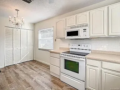 Kitchen and washer dryer area