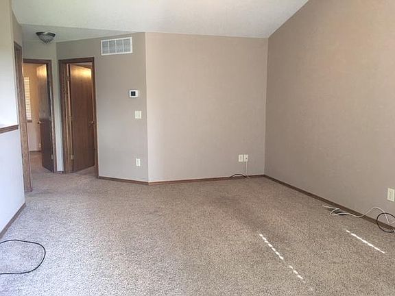 Living room with vaulted ceiling