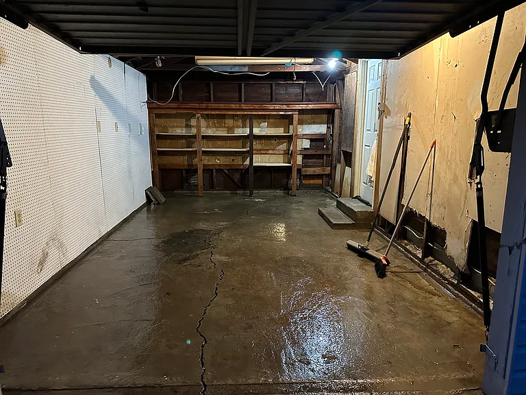 Garage with shelving.