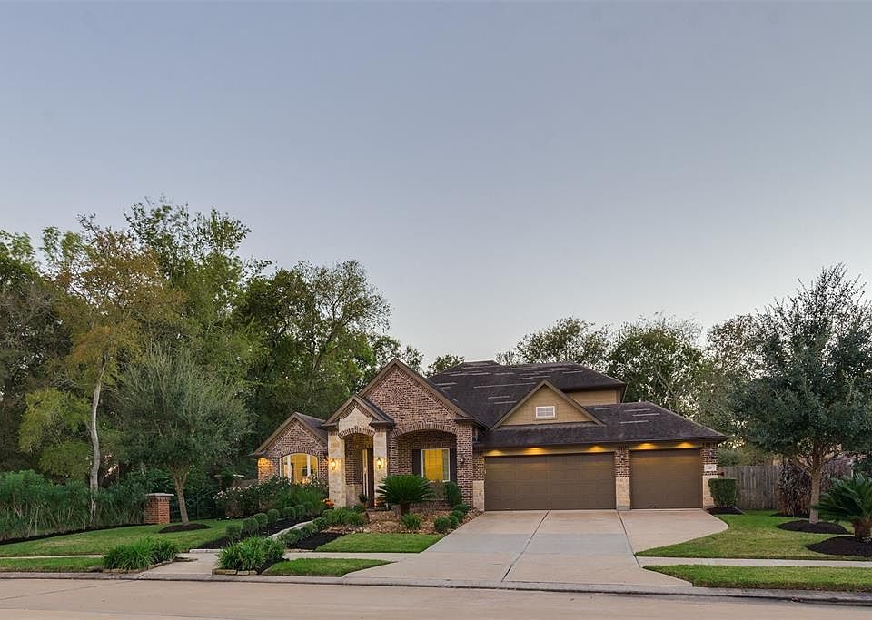 Welcome to Paradise! Nestled in the Mature Trees, this Rare Find One and a Half Story Former Model Home checks all the boxes! Three Car Garage along with Flexible Floor Plan elevate it to a League All of its Own!