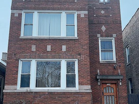 2nd image of 6136 S Mozart St Unit 1