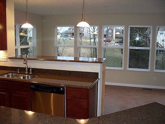 Cambria counters/tile kitchen & Morning Rm