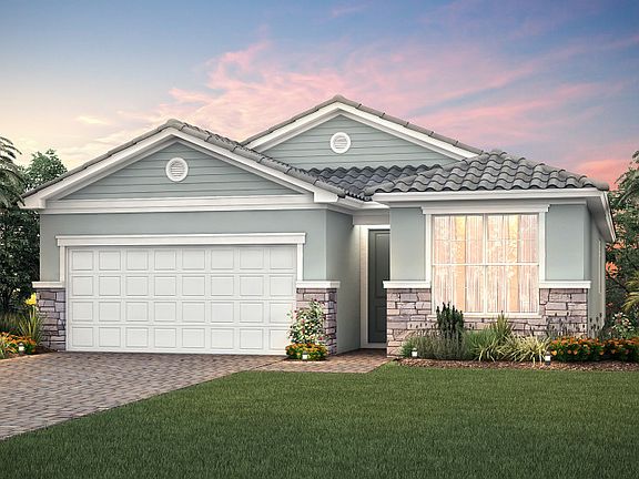 The Fox Hollow, a single-story family home with a 2 car garage, shown with Home Exterior FM2B