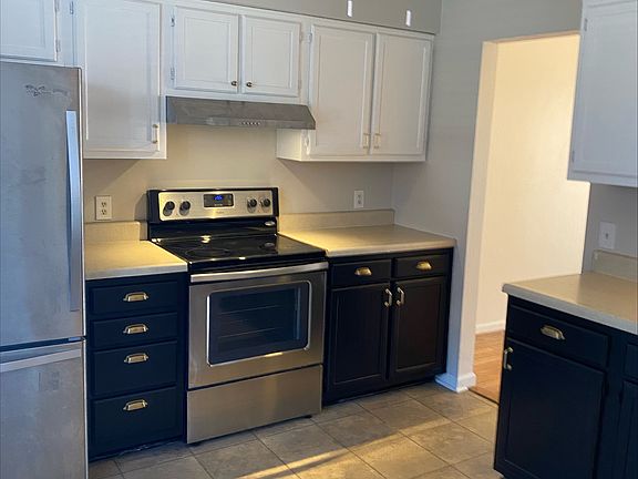 Kitchen. Fridge. Range. Microwave available upon request.