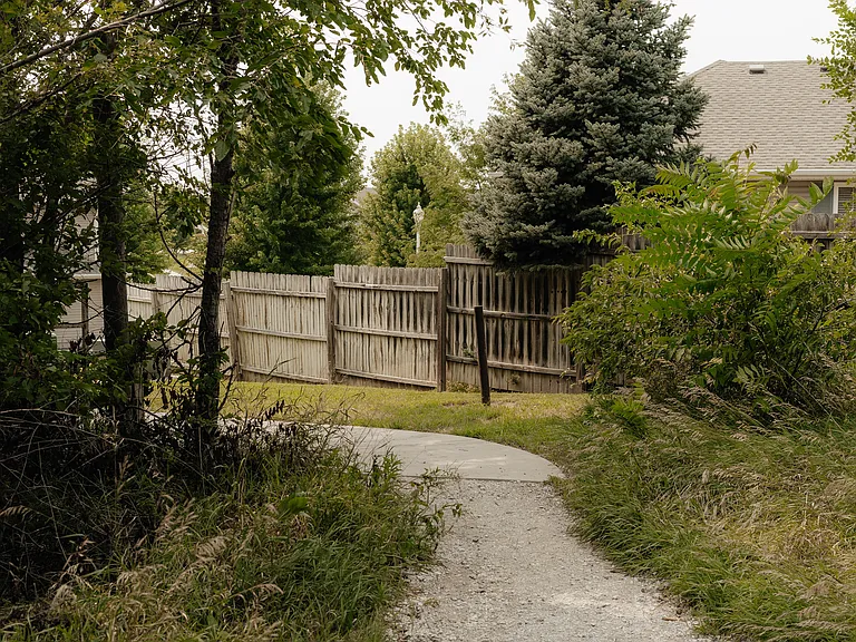 This path links the sidewalk to the Rock Island Trail