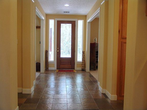 Foyer with accent columns and slate floors!