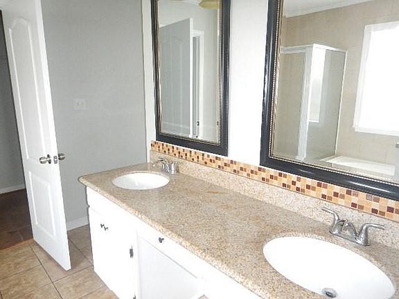 5th image of 2227 S Village Green St