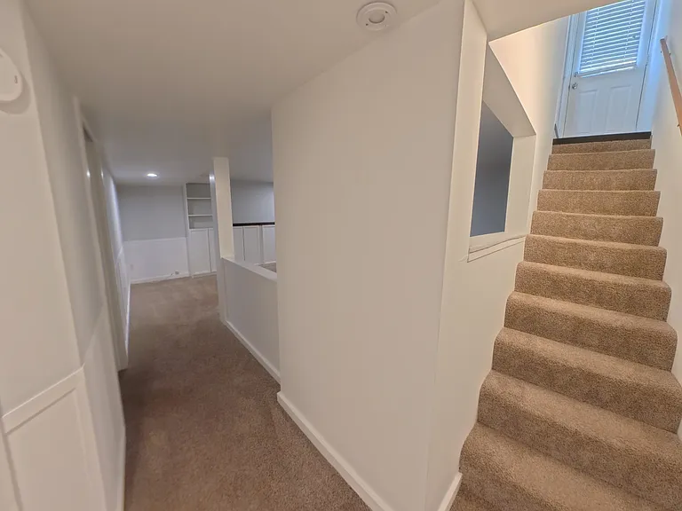 Basement stairs and hallway