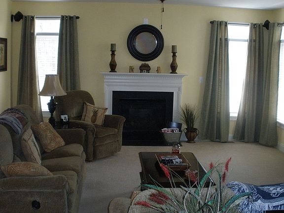large family room family room with gas fireplace and in wall surround sound