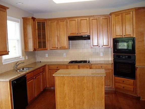 GRANITE COUNTER TOPS, HARDWOOD FLOORS