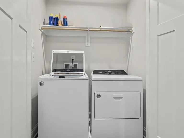 Laundry full-size washer and dryer provided