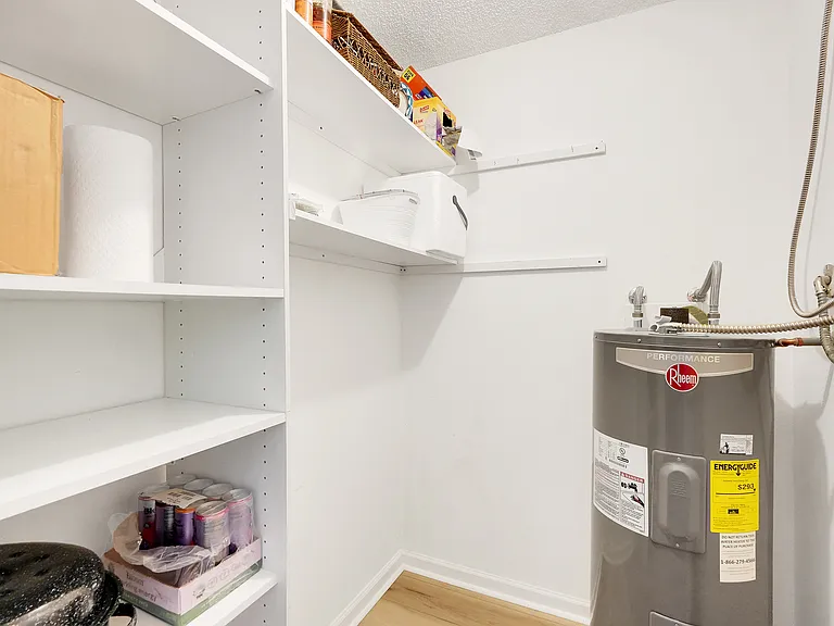 Large walk-in pantry equipped with multiple shelves for maximum storage and functionality.