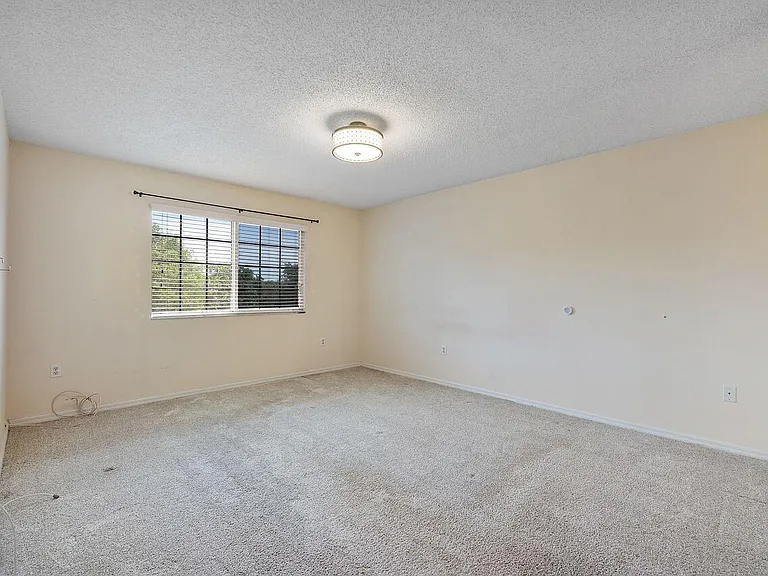 5011 Wiles Rd #303 — Photo 3